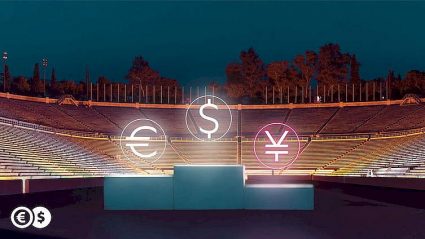 podium z walutami na stadionie: jen, dolar euro
