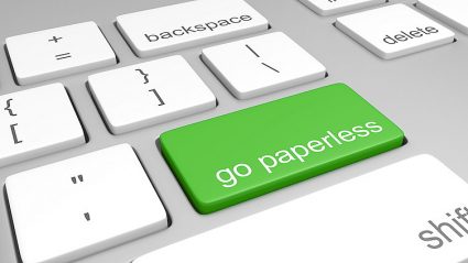zielony klawisz komputera (enter) z napisem go paperless