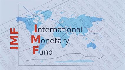 napis IMF na tle zestawienia kolumn liczb i osi X/Y