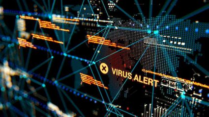 napis Virus alert na ekranie wirtualnym komputera