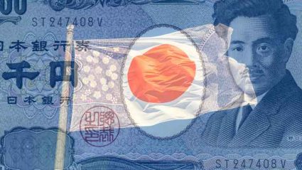 Flaga Japonii na tle pieniędzy